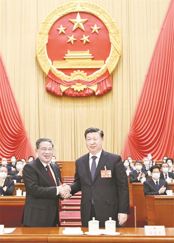 1-3 图2-1习近平同李强握手.jpg