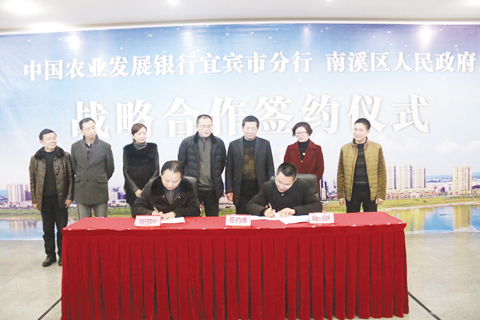9-3 2、周志坚（左）和李廷根（右）签约.jpg