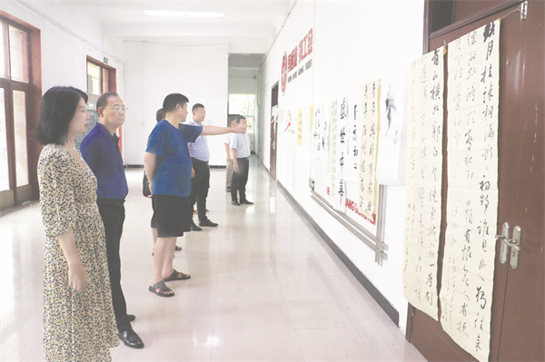 1722252422736978.jpg 8-5 8版书画展配图.jpg